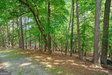 This gently sloped lot backs directly up to the lush fairways of on The Highlands Course at Lake Arrowhead in Georgia - for sale on GolfHomes.com, golf home, golf lot