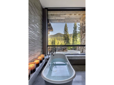 Perched on a basaltic ledge with panoramic views of creek on Martis Camp Golf Course in California - for sale on GolfHomes.com, golf home, golf lot