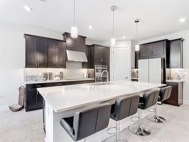 One or more photo(s) has been virtually staged. Outstanding on Stonegate Golf Club in Florida - for sale on GolfHomes.com, golf home, golf lot