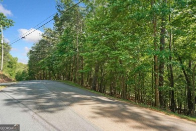 This gently sloped lot backs directly up to the lush fairways of on The Highlands Course at Lake Arrowhead in Georgia - for sale on GolfHomes.com, golf home, golf lot