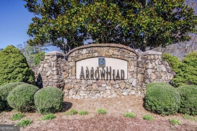 This gently sloped lot backs directly up to the lush fairways of on The Highlands Course at Lake Arrowhead in Georgia - for sale on GolfHomes.com, golf home, golf lot
