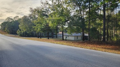 Beautiful homesite on smooth paved road in the growing on Citrus Springs Country Club in Florida - for sale on GolfHomes.com, golf home, golf lot