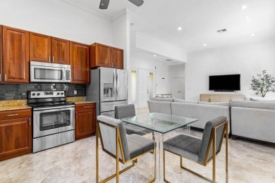Stunning 3 BD 2 BA situated on the golf course in Cambridge of on Woodfield Country Club in Florida - for sale on GolfHomes.com, golf home, golf lot