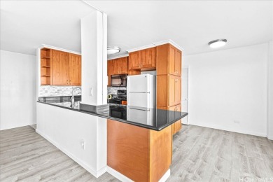Beautifully renovated 2-bedroom, 1.5-bathroom unit offering 977 on Ala Wai Golf Course in Hawaii - for sale on GolfHomes.com, golf home, golf lot
