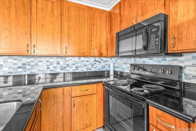 Beautifully renovated 2-bedroom, 1.5-bathroom unit offering 977 on Ala Wai Golf Course in Hawaii - for sale on GolfHomes.com, golf home, golf lot