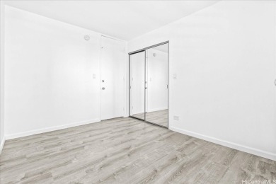Beautifully renovated 2-bedroom, 1.5-bathroom unit offering 977 on Ala Wai Golf Course in Hawaii - for sale on GolfHomes.com, golf home, golf lot
