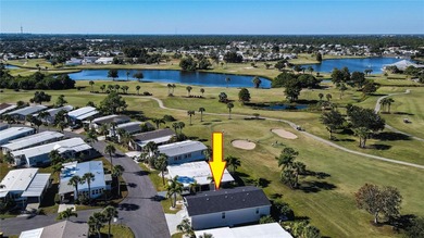 2005 Palm Harbor built home with an oversize one car garage and on Maple Leaf Golf and Country Club in Florida - for sale on GolfHomes.com, golf home, golf lot
