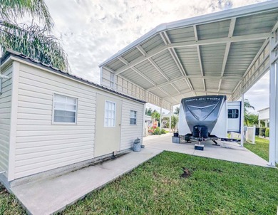 Spend your winters in warm, sunny central Florida near beaches on The Great Outdoors Golf and Country Club in Florida - for sale on GolfHomes.com, golf home, golf lot