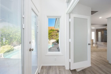 Set high in the scenic La Quinta Cove, this tastefully remodeled on Tradition Golf Club in California - for sale on GolfHomes.com, golf home, golf lot