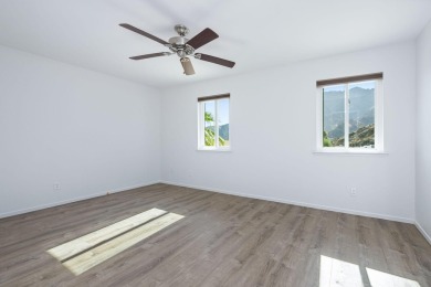 Set high in the scenic La Quinta Cove, this tastefully remodeled on Tradition Golf Club in California - for sale on GolfHomes.com, golf home, golf lot
