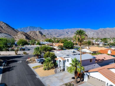 Set high in the scenic La Quinta Cove, this tastefully remodeled on Tradition Golf Club in California - for sale on GolfHomes.com, golf home, golf lot