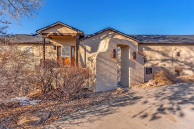 Enter this lovely home through the private courtyard to the on Desert Hawk At Pueblo West in Colorado - for sale on GolfHomes.com, golf home, golf lot