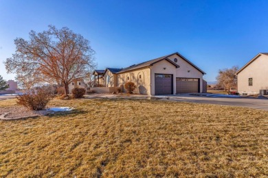 Enter this lovely home through the private courtyard to the on Desert Hawk At Pueblo West in Colorado - for sale on GolfHomes.com, golf home, golf lot