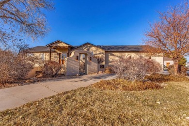 Enter this lovely home through the private courtyard to the on Desert Hawk At Pueblo West in Colorado - for sale on GolfHomes.com, golf home, golf lot