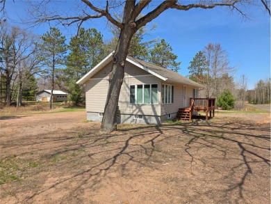 Welcome to 28811 Cr-H in Danbury -- where quality craftsmanship on Voyager Village Country Club - Voyager in Wisconsin - for sale on GolfHomes.com, golf home, golf lot