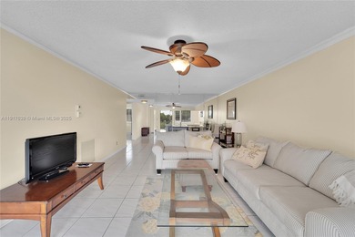 A TOP-RATED 55+ COMMUNITY! Beautifully maintained 2/2 condo in on Sunrise Lakes Phase IV Golf Course in Florida - for sale on GolfHomes.com, golf home, golf lot