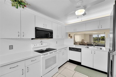 A TOP-RATED 55+ COMMUNITY! Beautifully maintained 2/2 condo in on Sunrise Lakes Phase IV Golf Course in Florida - for sale on GolfHomes.com, golf home, golf lot