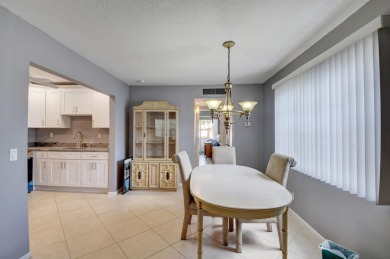 Walking distance to House of Worship remodeled 2nd floor condo on Kings Point Golf -Flanders Way in Florida - for sale on GolfHomes.com, golf home, golf lot