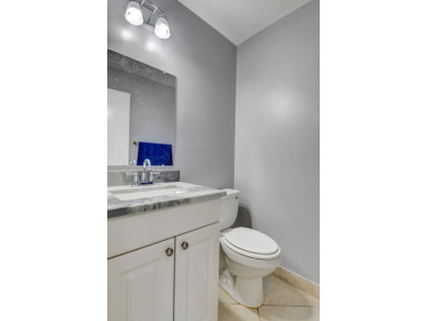 Walking distance to House of Worship remodeled 2nd floor condo on Kings Point Golf -Flanders Way in Florida - for sale on GolfHomes.com, golf home, golf lot