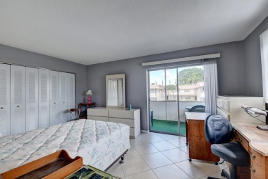 Walking distance to House of Worship remodeled 2nd floor condo on Kings Point Golf -Flanders Way in Florida - for sale on GolfHomes.com, golf home, golf lot