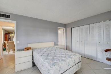 Walking distance to House of Worship remodeled 2nd floor condo on Kings Point Golf -Flanders Way in Florida - for sale on GolfHomes.com, golf home, golf lot