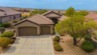 Imagine stepping into a stunning 3 bedroom 2 bath home nestled on Laughlin Ranch Golf Club in Arizona - for sale on GolfHomes.com, golf home, golf lot