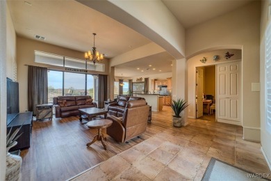 Imagine stepping into a stunning 3 bedroom 2 bath home nestled on Laughlin Ranch Golf Club in Arizona - for sale on GolfHomes.com, golf home, golf lot