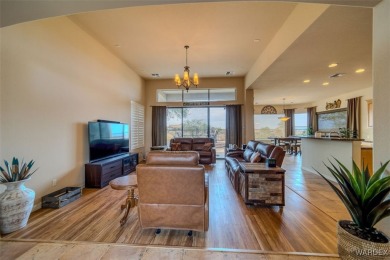 Imagine stepping into a stunning 3 bedroom 2 bath home nestled on Laughlin Ranch Golf Club in Arizona - for sale on GolfHomes.com, golf home, golf lot