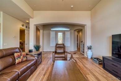 Imagine stepping into a stunning 3 bedroom 2 bath home nestled on Laughlin Ranch Golf Club in Arizona - for sale on GolfHomes.com, golf home, golf lot