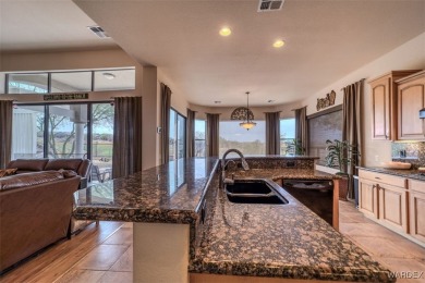 Imagine stepping into a stunning 3 bedroom 2 bath home nestled on Laughlin Ranch Golf Club in Arizona - for sale on GolfHomes.com, golf home, golf lot