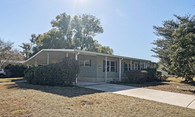 One or more photo(s) has been virtually staged. TIRED OF WINTER? on Zellwood Station Country Club in Florida - for sale on GolfHomes.com, golf home, golf lot