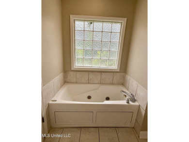 100% USDA financing available to qualified buyers! 3 bedroom, 2 on Castlewoods Golf Club in Mississippi - for sale on GolfHomes.com, golf home, golf lot