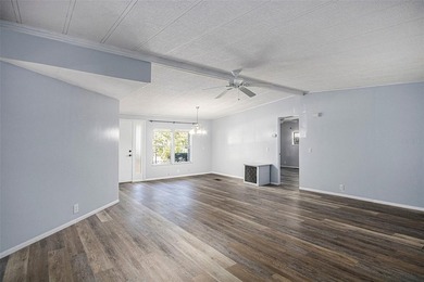 One or more photo(s) has been virtually staged. IMPROVED PRICE on Zellwood Station Country Club in Florida - for sale on GolfHomes.com, golf home, golf lot