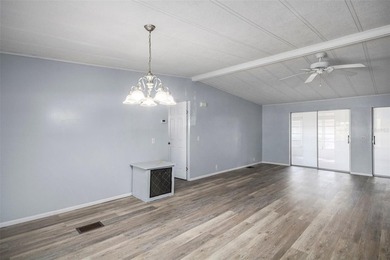 One or more photo(s) has been virtually staged. IMPROVED PRICE on Zellwood Station Country Club in Florida - for sale on GolfHomes.com, golf home, golf lot