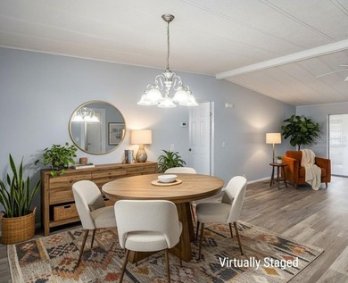 One or more photo(s) has been virtually staged. IMPROVED PRICE on Zellwood Station Country Club in Florida - for sale on GolfHomes.com, golf home, golf lot