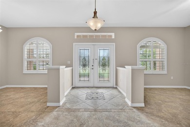 BEAUTIFULLY UPDATED 3-BEDROOM, 2-BATH, 2-CAR GARAGE HOME NESTLED on Bobcat Trail Golf Club in Florida - for sale on GolfHomes.com, golf home, golf lot