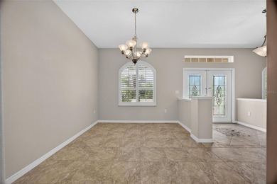 BEAUTIFULLY UPDATED 3-BEDROOM, 2-BATH, 2-CAR GARAGE HOME NESTLED on Bobcat Trail Golf Club in Florida - for sale on GolfHomes.com, golf home, golf lot