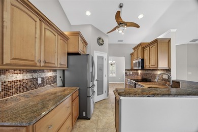 BEAUTIFULLY UPDATED 3-BEDROOM, 2-BATH, 2-CAR GARAGE HOME NESTLED on Bobcat Trail Golf Club in Florida - for sale on GolfHomes.com, golf home, golf lot