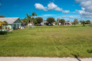 Build your dream home on this oversized beautiful canal lot that on Rotonda Golf and Country Club The Palms Course in Florida - for sale on GolfHomes.com, golf home, golf lot