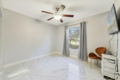 A welcoming blend of style, expertly designed space, and peace on Stoneybrook East Golf Club in Florida - for sale on GolfHomes.com, golf home, golf lot