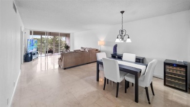 Experience the charm of Palm Aire in this beautifully updated on Palm-Aire Country Club and Resort - The Oaks in Florida - for sale on GolfHomes.com, golf home, golf lot
