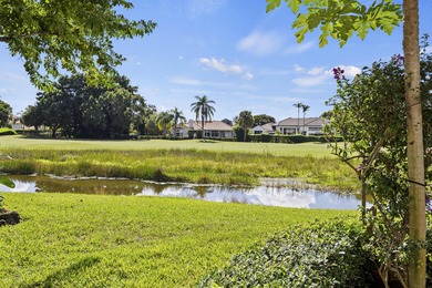 Golfers Family Paradise. Set on the 14th fairway of PGA's Palmer on PGA National Golf Club in Florida - for sale on GolfHomes.com, golf home, golf lot