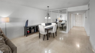 Experience the charm of Palm Aire in this beautifully updated on Palm-Aire Country Club and Resort - The Oaks in Florida - for sale on GolfHomes.com, golf home, golf lot