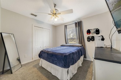 A welcoming blend of style, expertly designed space, and peace on Stoneybrook East Golf Club in Florida - for sale on GolfHomes.com, golf home, golf lot