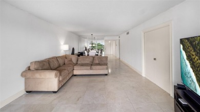 Experience the charm of Palm Aire in this beautifully updated on Palm-Aire Country Club and Resort - The Oaks in Florida - for sale on GolfHomes.com, golf home, golf lot