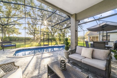 A welcoming blend of style, expertly designed space, and peace on Stoneybrook East Golf Club in Florida - for sale on GolfHomes.com, golf home, golf lot