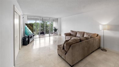 Experience the charm of Palm Aire in this beautifully updated on Palm-Aire Country Club and Resort - The Oaks in Florida - for sale on GolfHomes.com, golf home, golf lot