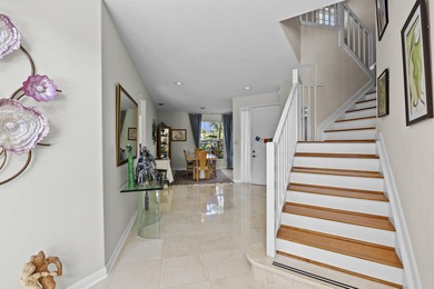 Golfers Family Paradise. Set on the 14th fairway of PGA's Palmer on PGA National Golf Club in Florida - for sale on GolfHomes.com, golf home, golf lot