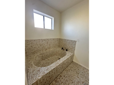 Charming Mesa Del Sol Fixer-Upper - $10,000 Flooring Allowance on Mesa Del Sol Golf Club in Arizona - for sale on GolfHomes.com, golf home, golf lot