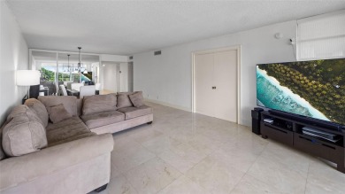 Experience the charm of Palm Aire in this beautifully updated on Palm-Aire Country Club and Resort - The Oaks in Florida - for sale on GolfHomes.com, golf home, golf lot